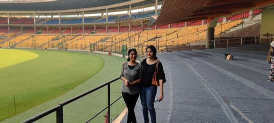 Picture of two women on the cricket stadium