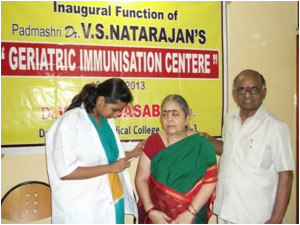 Dr Natarajan with a patient during an immunisation drive Pic courtesy: Dr VS Natarajan