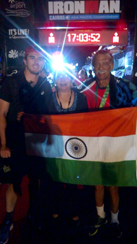 Arun with the Tricolour, his wife and Nick, the volunteer who encouraged him.
